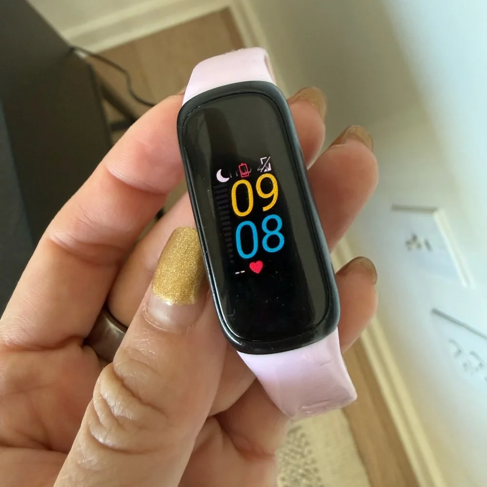 For parts — Lilac FitBit inspire 3 and two USB chargers